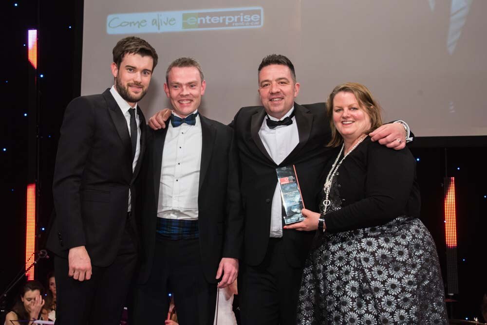 Enterprise employees accepting an award